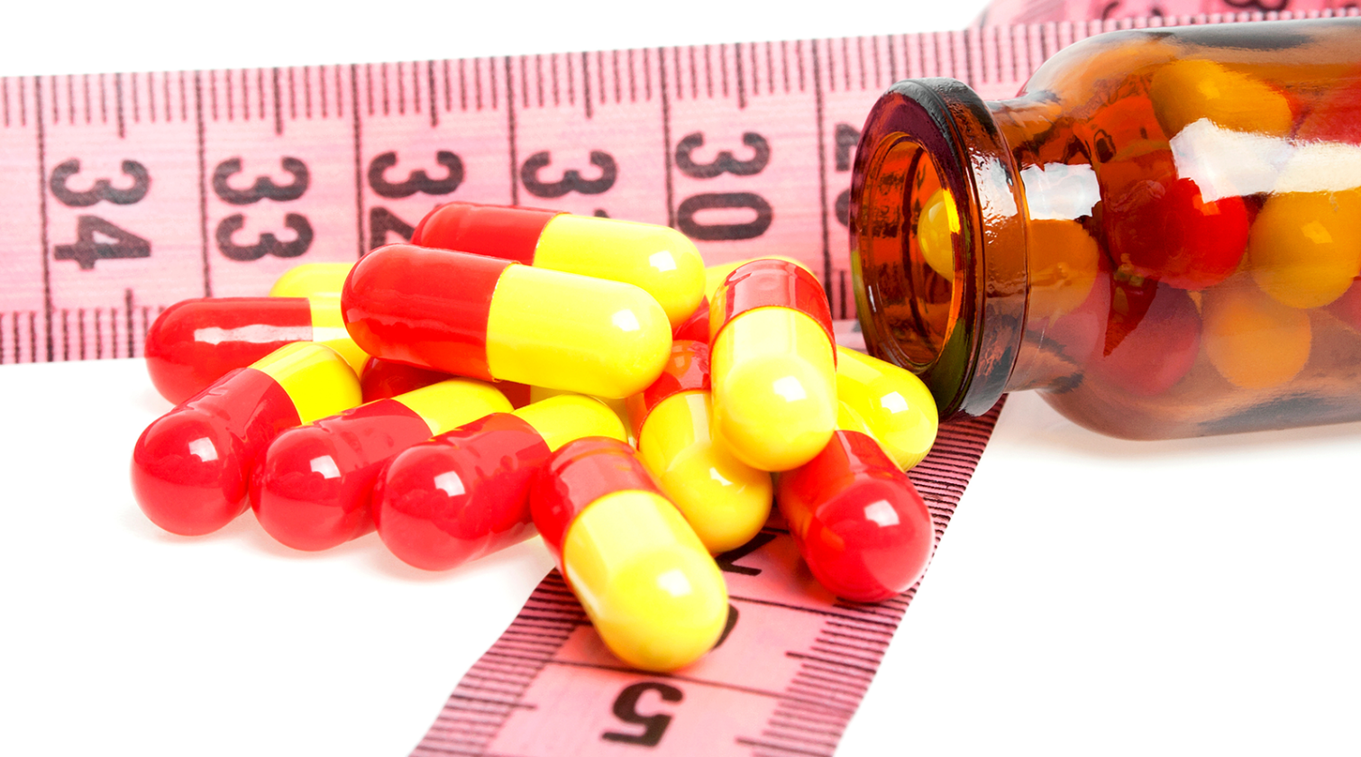 Foto (kleur) medicijnen op meetlint